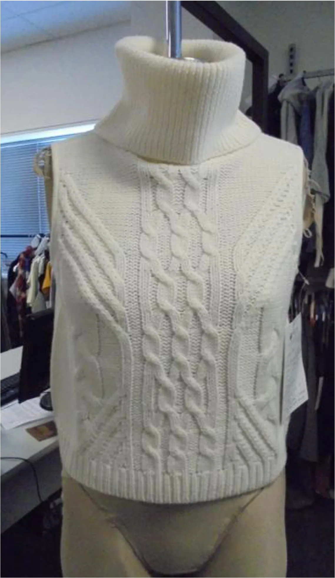 FARAWAY S/LESS ROLL NECK KNIT
